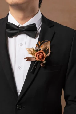 Boutonnieres in Black & Pumpkin Orange