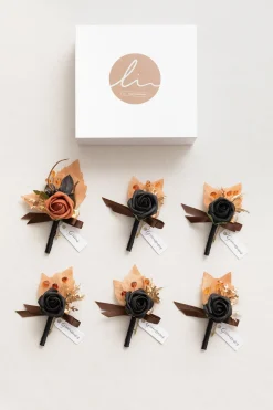 Boutonnieres in Black & Pumpkin Orange