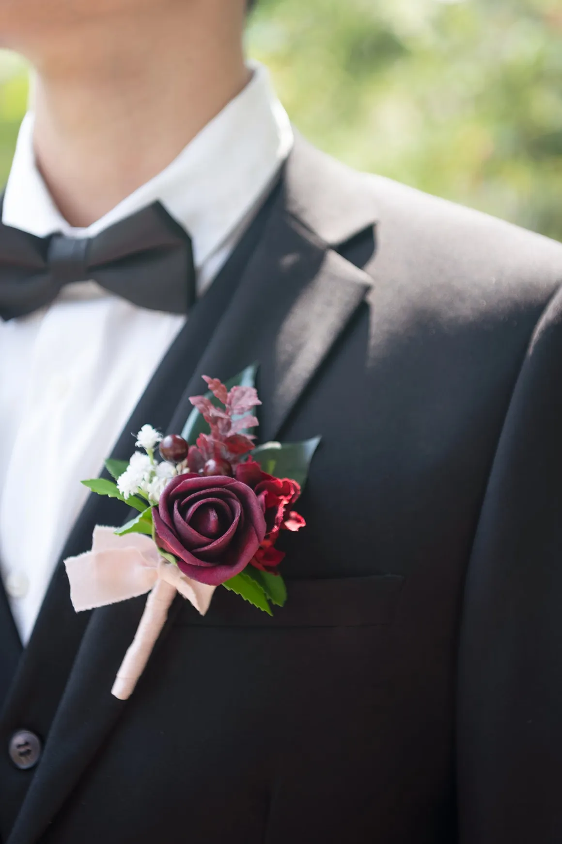 Boutonnieres in Classic Marsala