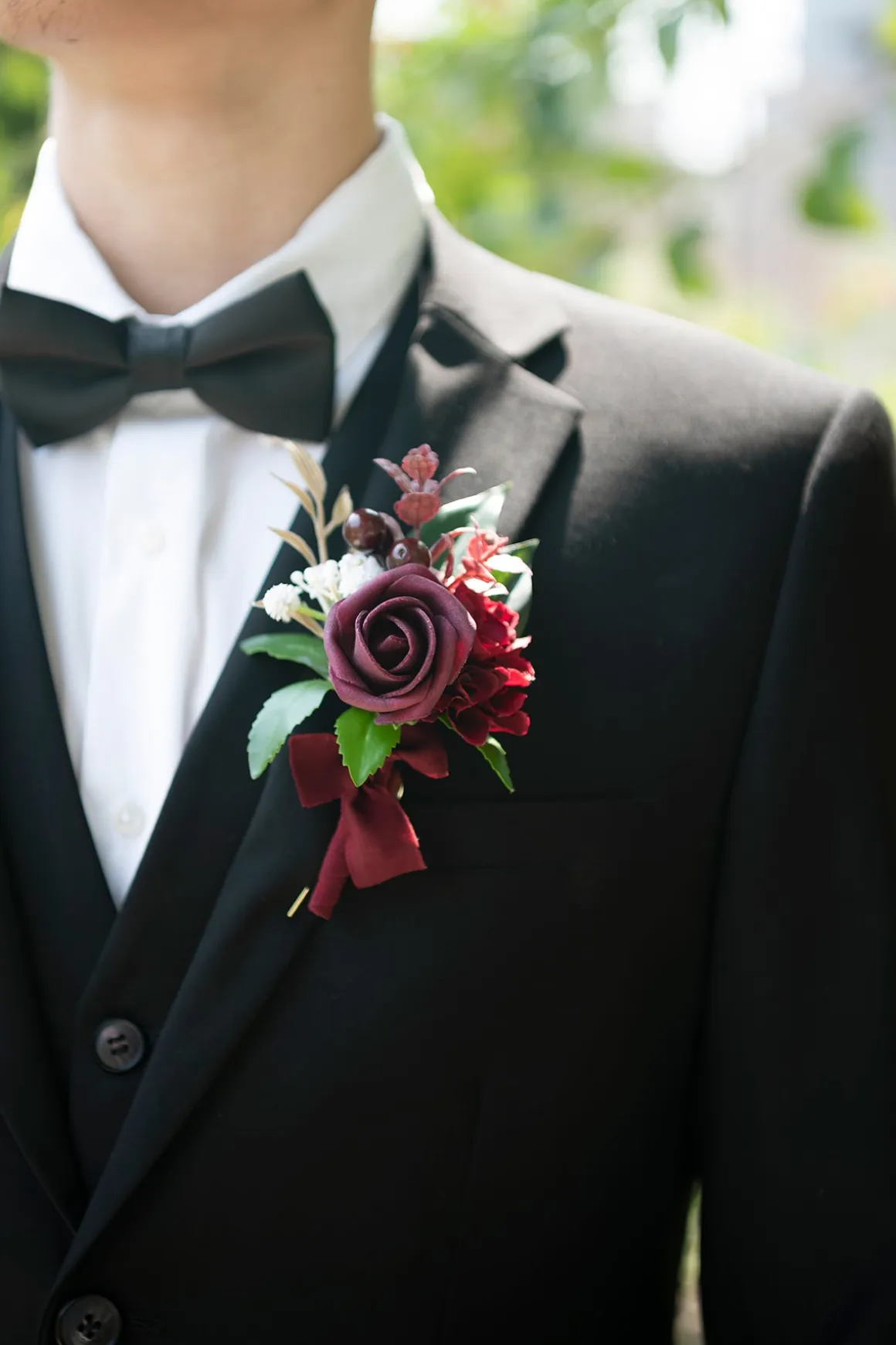 Boutonnieres in Classic Marsala