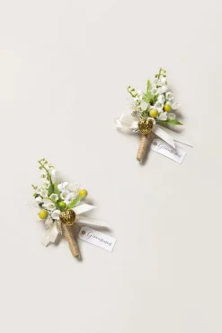 Boutonnieres in May Lily & Olive