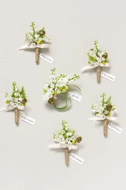 Boutonnieres in May Lily & Olive