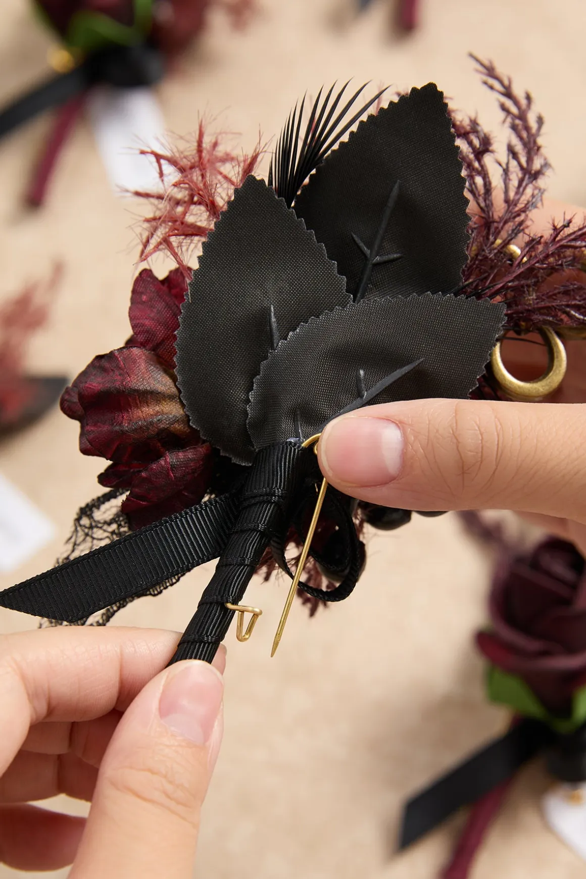 Boutonnieres in Moody Burgundy & Black