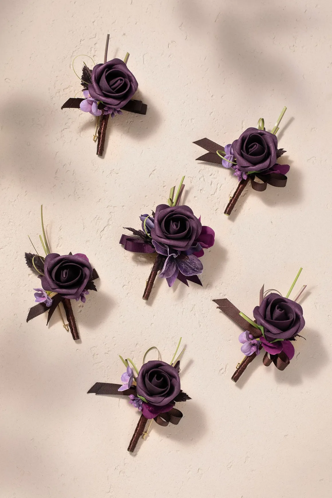 Boutonnieres in Plum Velvet Wedding