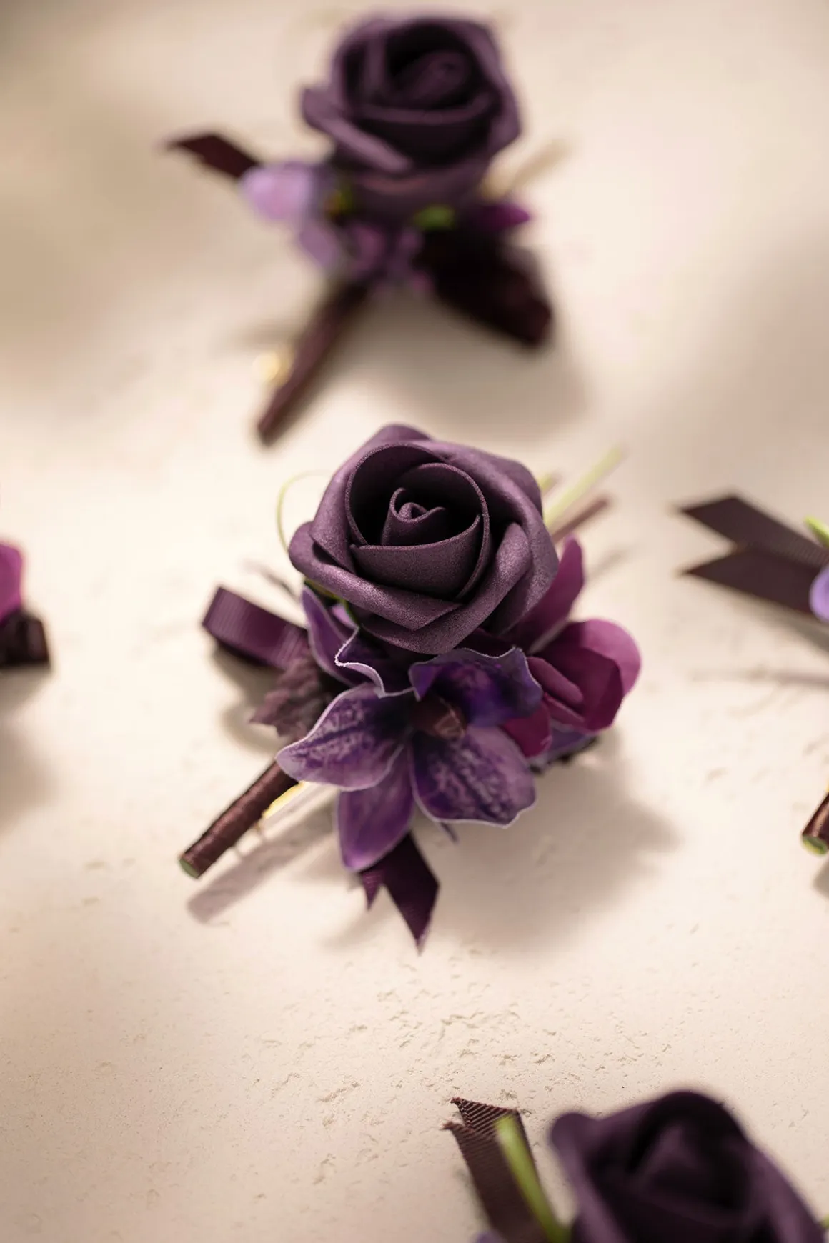 Boutonnieres in Plum Velvet Wedding