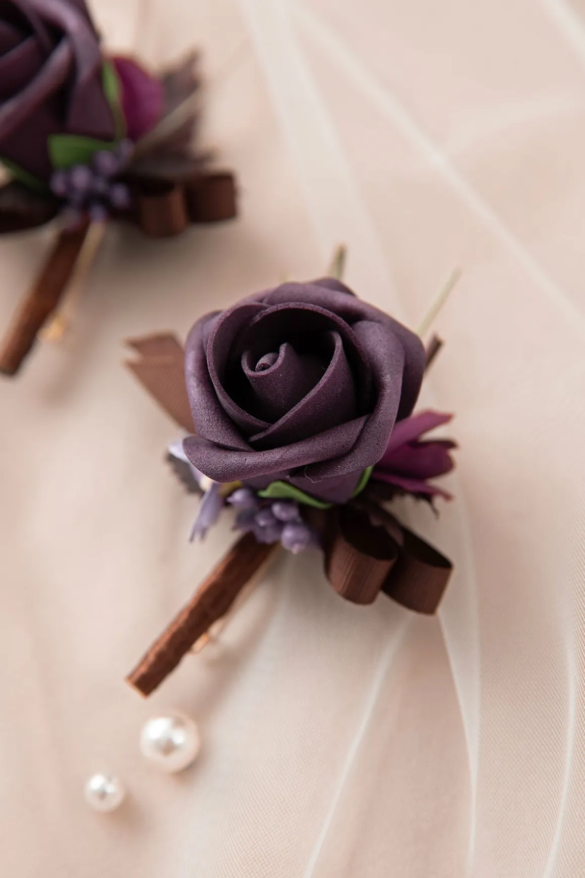 Boutonnieres in Plum Velvet Wedding
