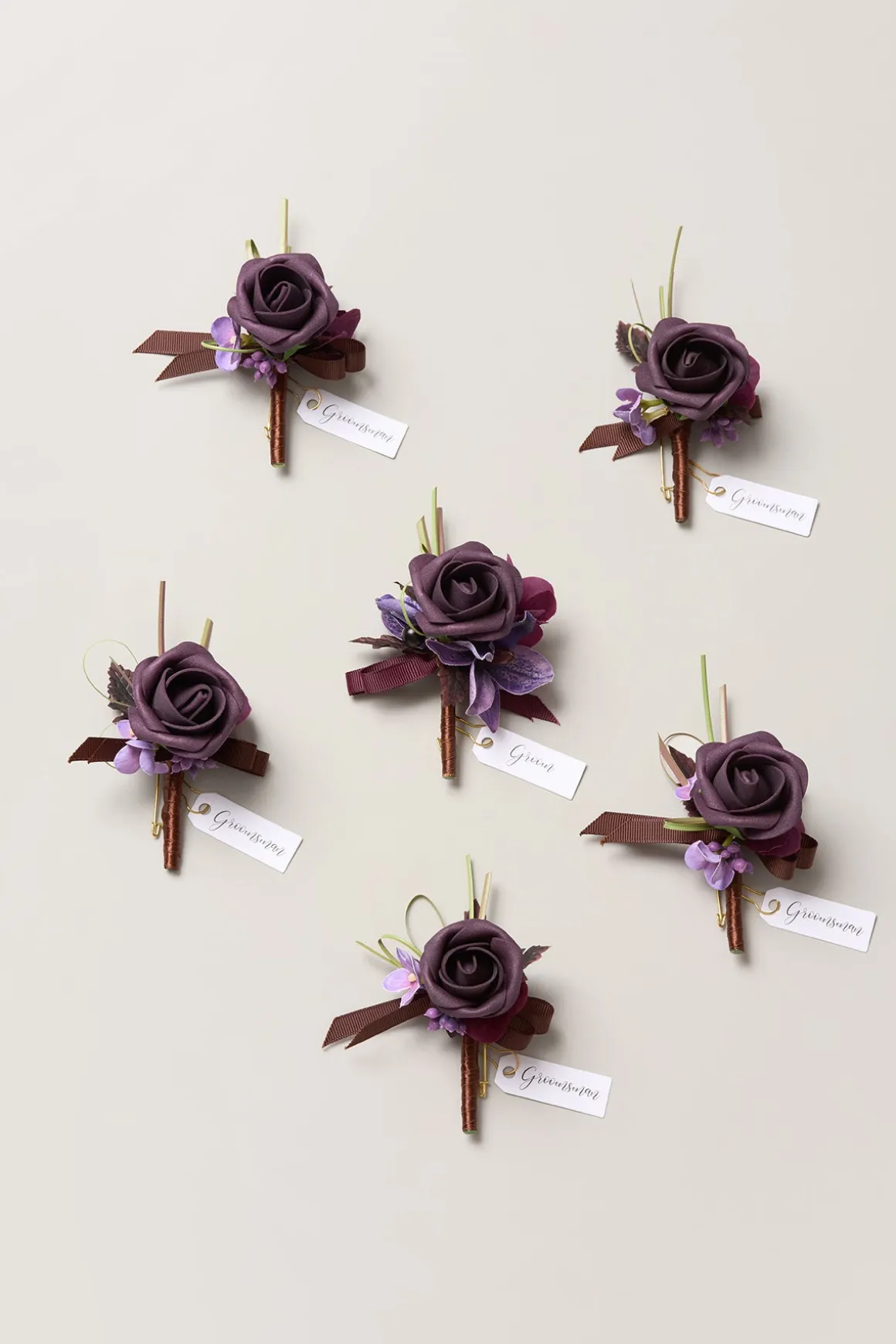 Boutonnieres in Plum Velvet Wedding