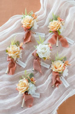 Boutonnieres in Sunset Terracotta