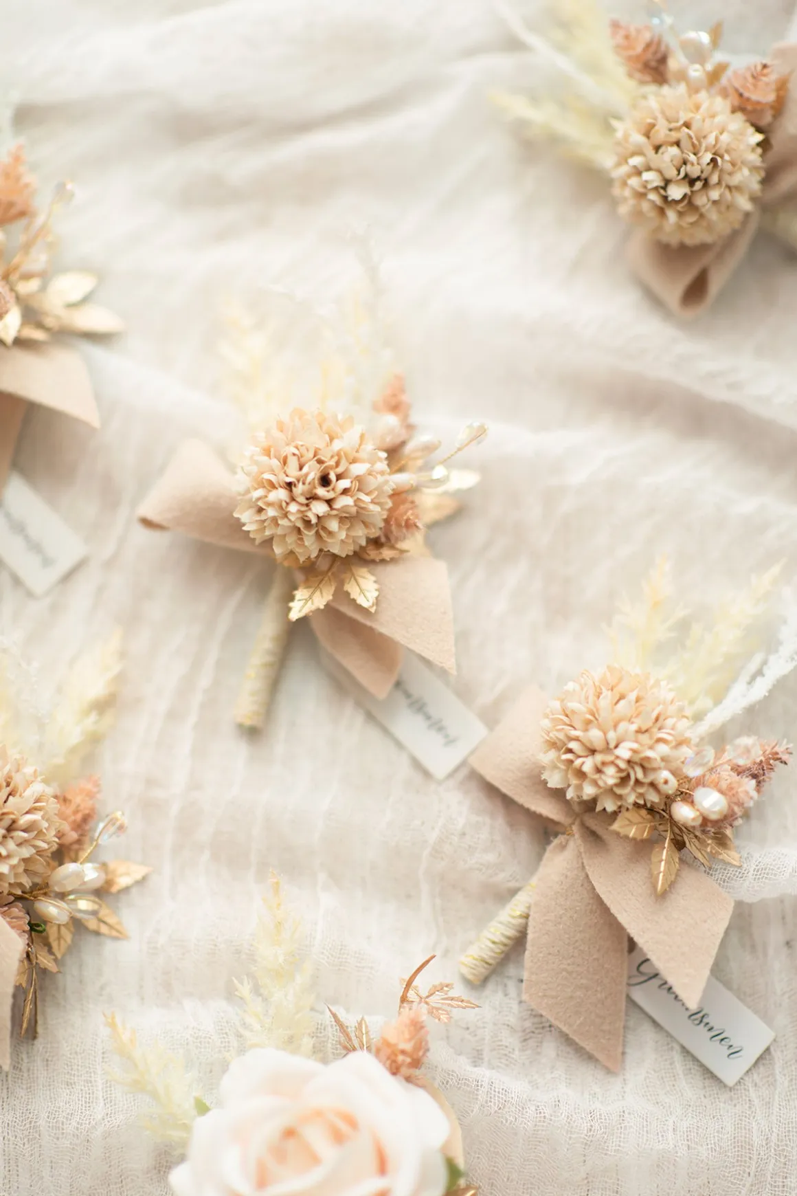 Boutonnieres in White & Beige