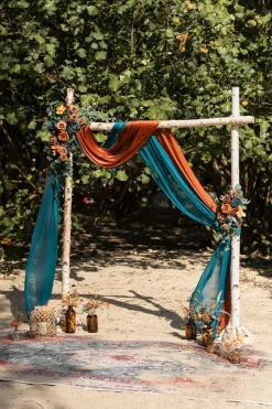 Flower Arch Decor with Drapes in Dark Teal & Burnt Orange
